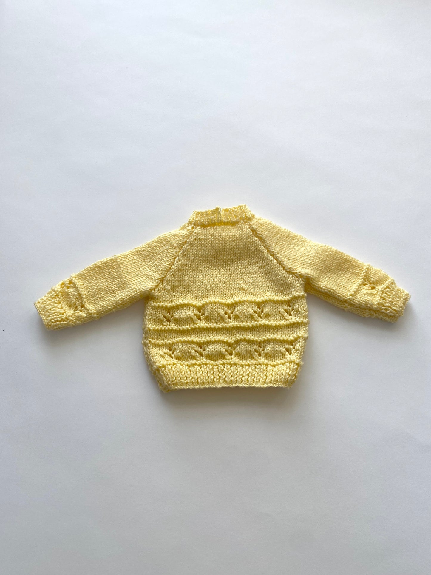 Yellow lemon hand-knitted baby jumper age 0-3m