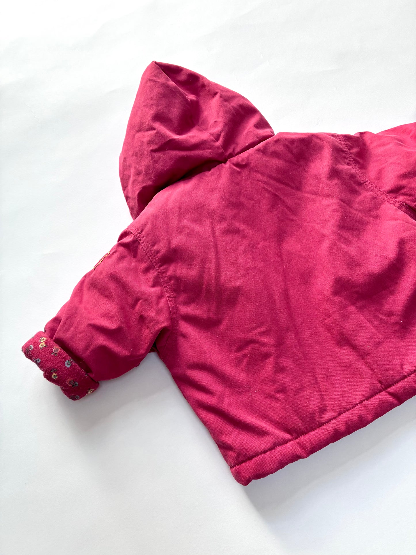 Red floral lined coat Age 3-6m