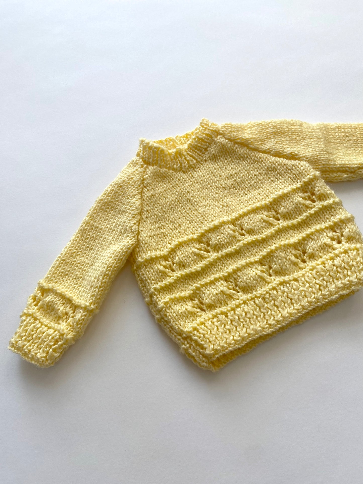 Yellow lemon hand-knitted baby jumper age 0-3m