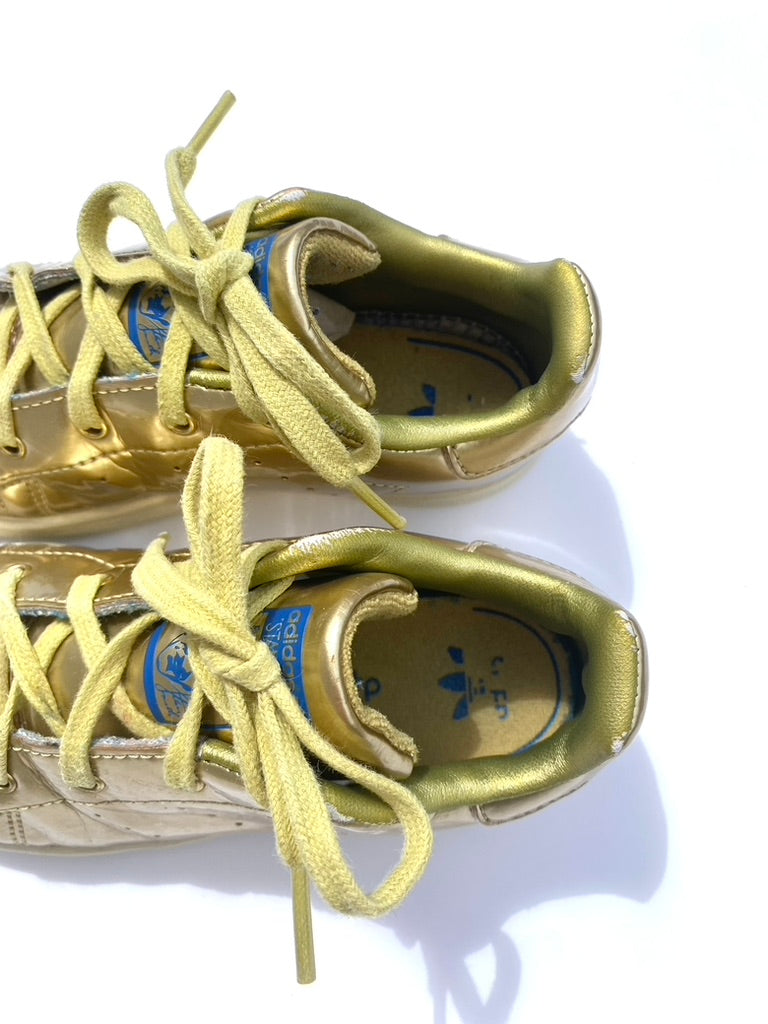 Gold Adidas trainers Size 9