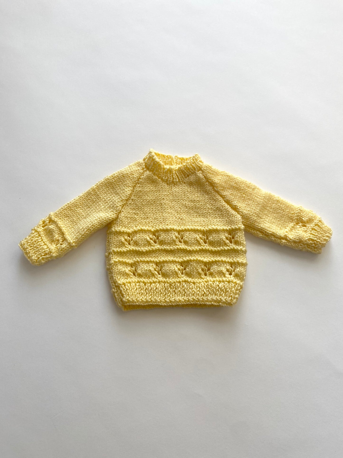 Yellow lemon hand-knitted baby jumper age 0-3m