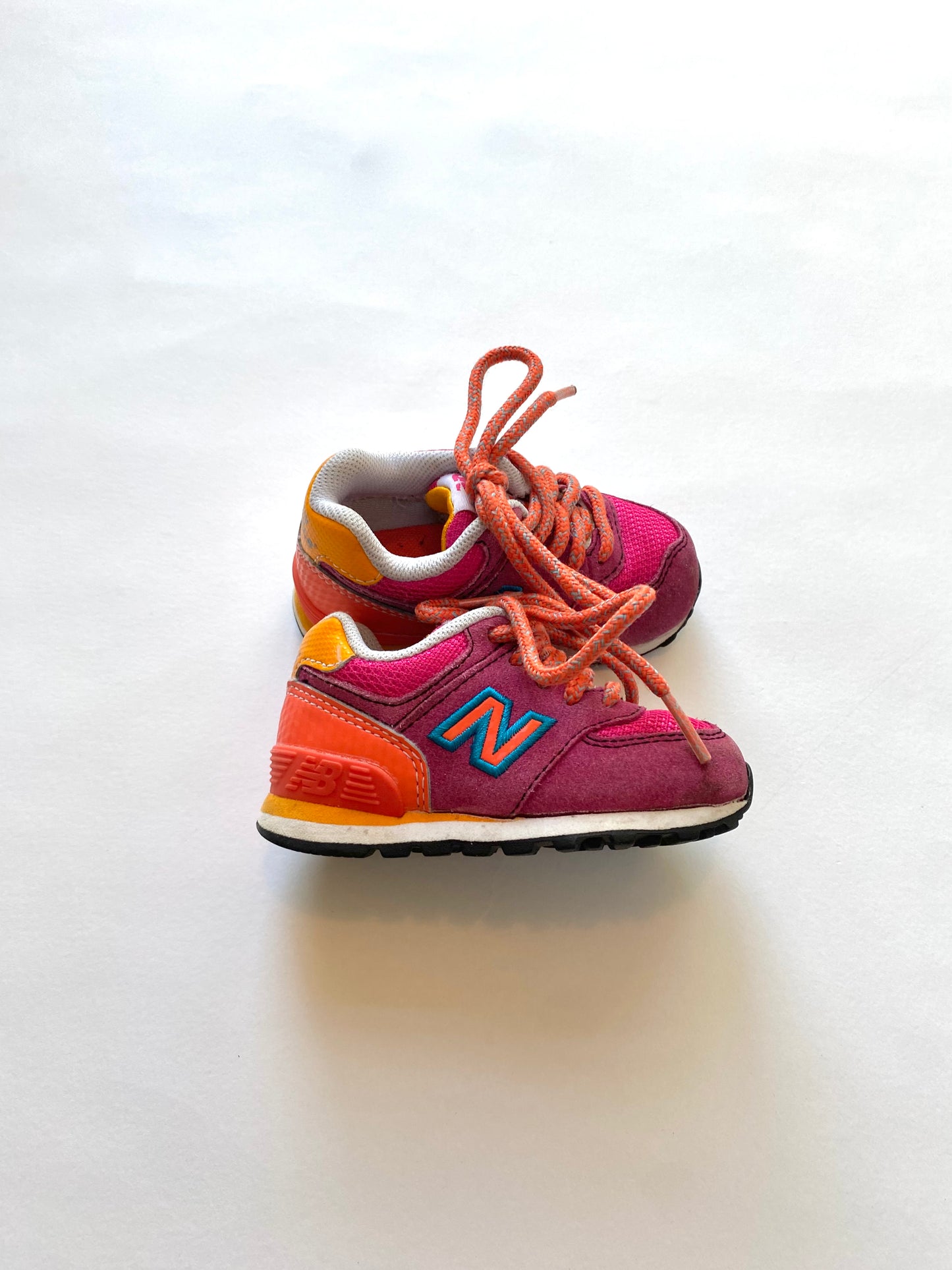 Pink and orange New Balance 574 Size 4